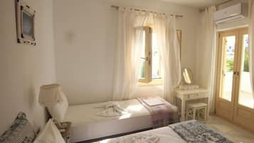 Laptop workspace, blackout drapes, soundproofing, iron/ironing board