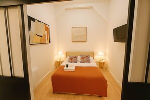 1 slaapkamer, een strijkplank/strijkijzer, wifi, beddengoed