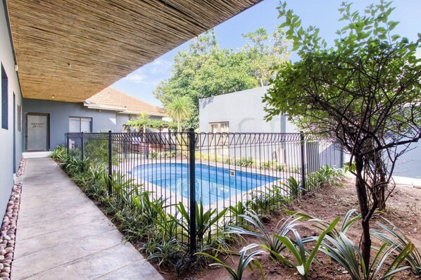 Outdoor pool, pool umbrellas, pool loungers
