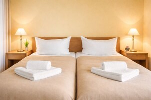 Suite estudio estándar | Caja fuerte, sistema de insonorización, wifi gratis y ropa de cama