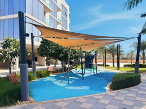 Children’s area - Refined 2BR Apartment District One MBR (Dubai)
