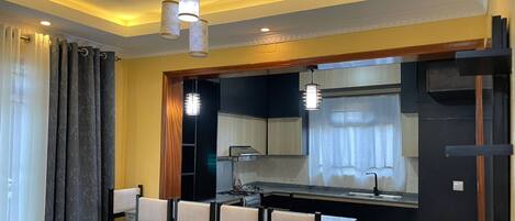 Deluxe Quadruple Room | Private kitchen