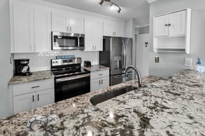 Signature Condo, 2 Bedrooms, Balcony, Partial Ocean View | Private kitchen | Fridge, microwave, oven, stovetop - Ocean Dunes Villas (Myrtle Beach)