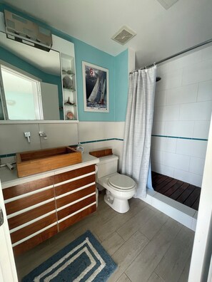 Shower, hair dryer, towels, soap