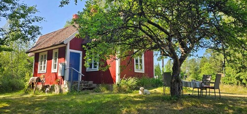 Idyllic country house with rowing boat