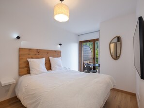 2 bedrooms, WiFi - Modern apartment with large terrace in Cernix (Cohennoz)