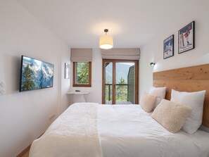 2 bedrooms, WiFi - Modern apartment with large terrace in Cernix (Cohennoz)