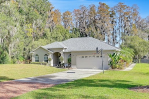 Front of property - Dock, Lanai & Pool! Modern Red Bug Lake Retreat (Land O' Lakes)