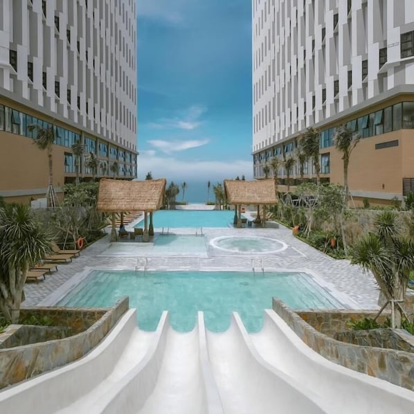 4 outdoor pools, open 8:00 AM to 8:00 PM, pool umbrellas, sun loungers - The Raclay Mandala Cham Bay Mui Ne (Phan Thiet)