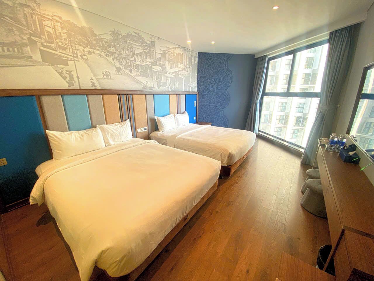 Chambre Triple Premium, vue partielle sur l'océan | Coffres-forts dans les chambres, bureau