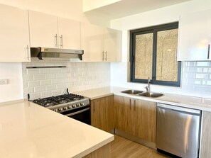 Fridge, microwave, oven, stovetop - Chic 2BR Apt 1km from Playa Bonita (Las Terrenas)