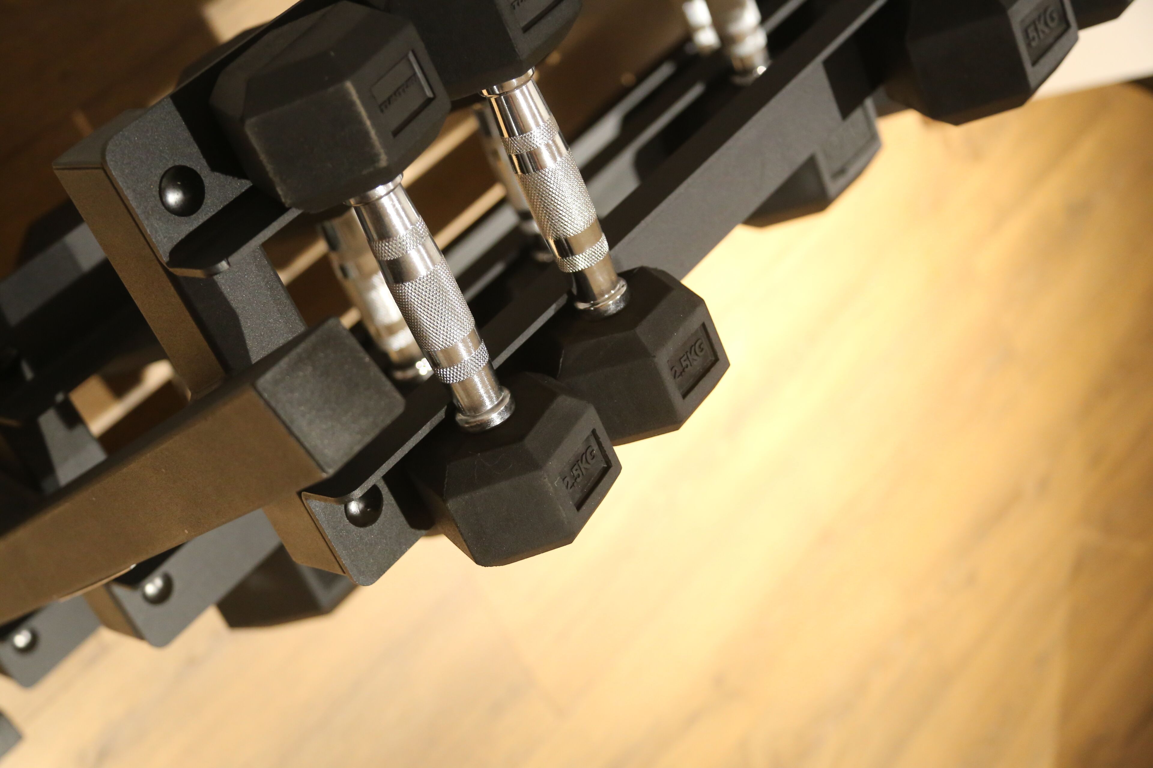 A close-up of a mechanical device with metallic components and black plastic parts.