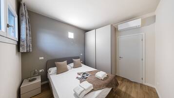 1 chambre, fer et planche Ă repasser, Wi-Fi gratuit, draps fournis