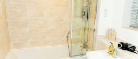 Shower, jetted bath, hair dryer, bidet