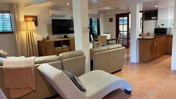 Apartment, 2 Bedrooms, Smoking, Balcony | Living area | DVD player, books