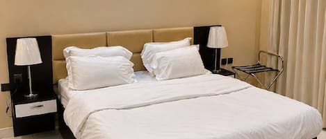 Premium bedding, pillowtop beds, in-room safe, blackout drapes