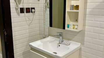 Suite, 1 Bedroom | Bathroom | Separate bathtub and shower, hair dryer, slippers, towels