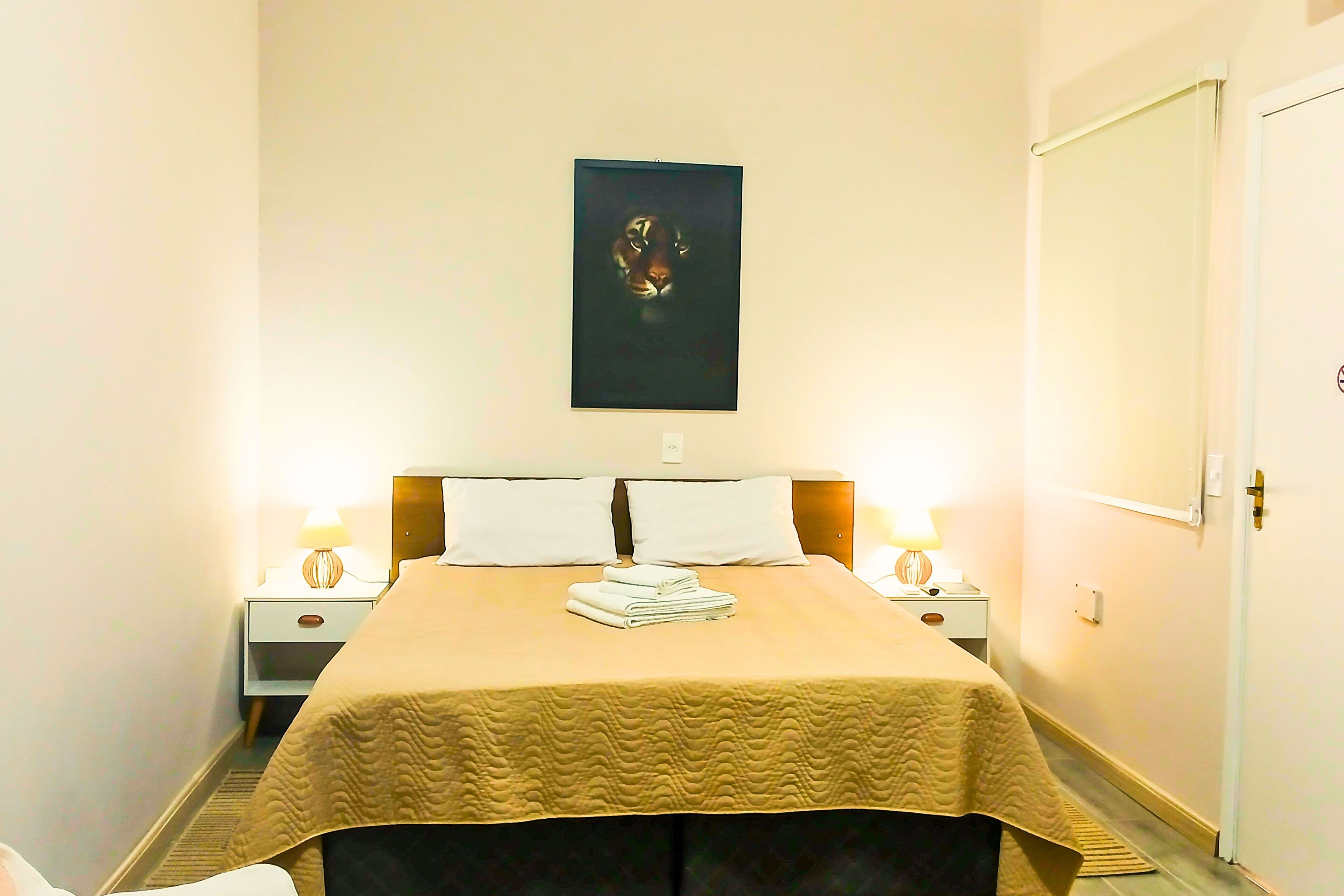 Deluxe Double Room, Courtyard View | Pillow-top beds, iron/ironing board, free WiFi, bed sheets