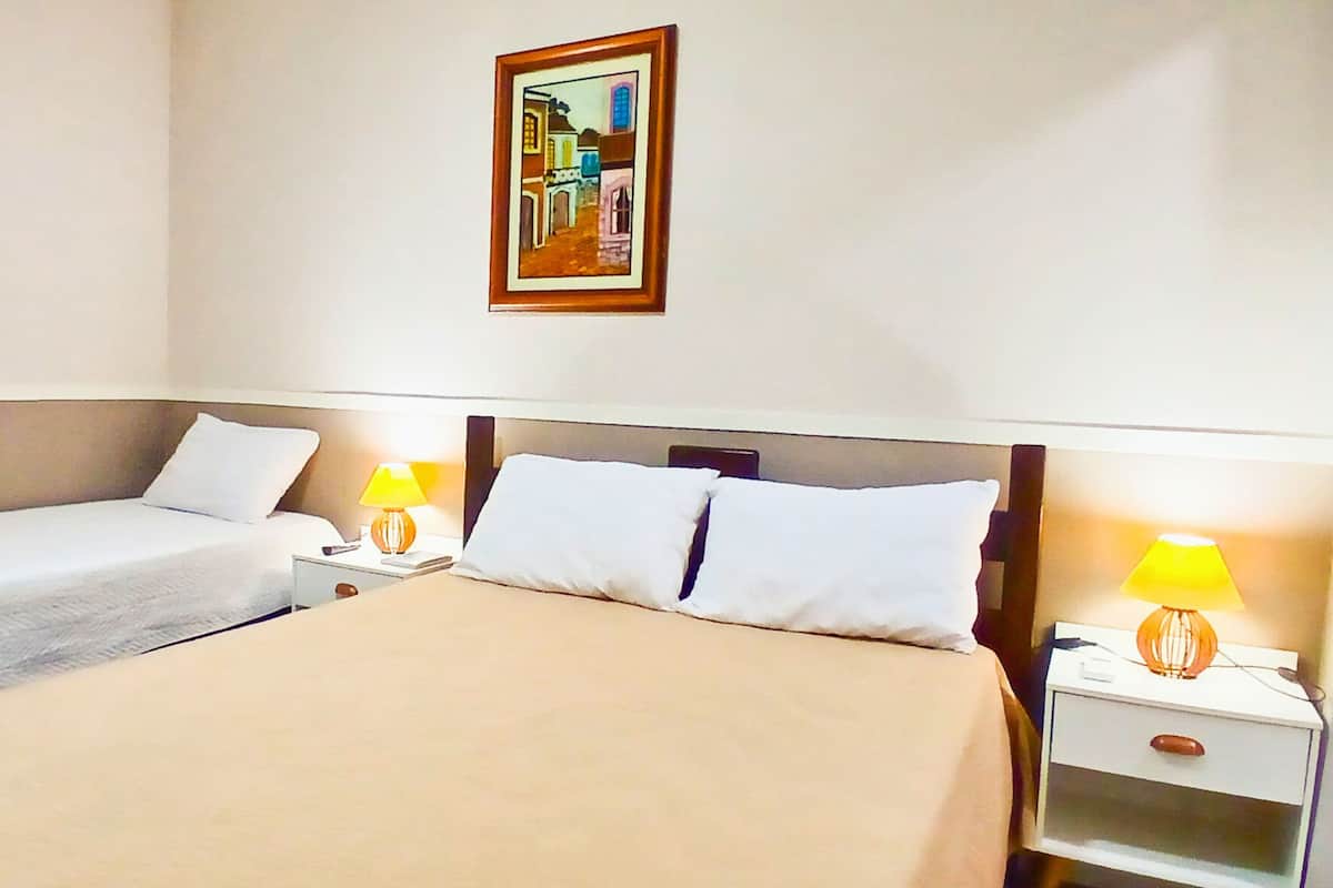 Classic Triple Room, Courtyard View | Pillow-top beds, iron/ironing board, free WiFi, bed sheets