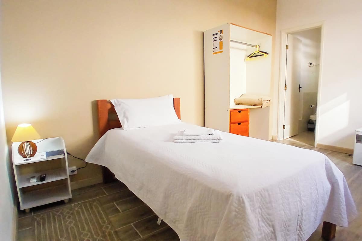 Economy Single Room, Courtyard View | Pillow-top beds, iron/ironing board, free WiFi, bed sheets