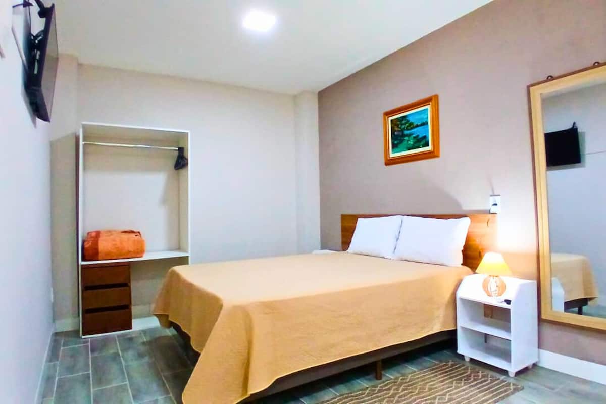 Double Room, Courtyard View | Pillow-top beds, iron/ironing board, free WiFi, bed sheets