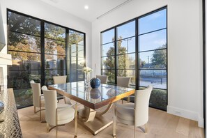 Dining - New luxury modern home in Midway Hollow with heated pool, private casita, indoor/outdoor living, designer furnishings, garage, and concierge service. Perfect for families, groups, or extended stays. (Dallas)