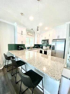 Fridge, microwave, oven, stovetop - Henderson Haven 4 BR / 3 BA Villa, Steps to Beach (Wrightsville Beach)