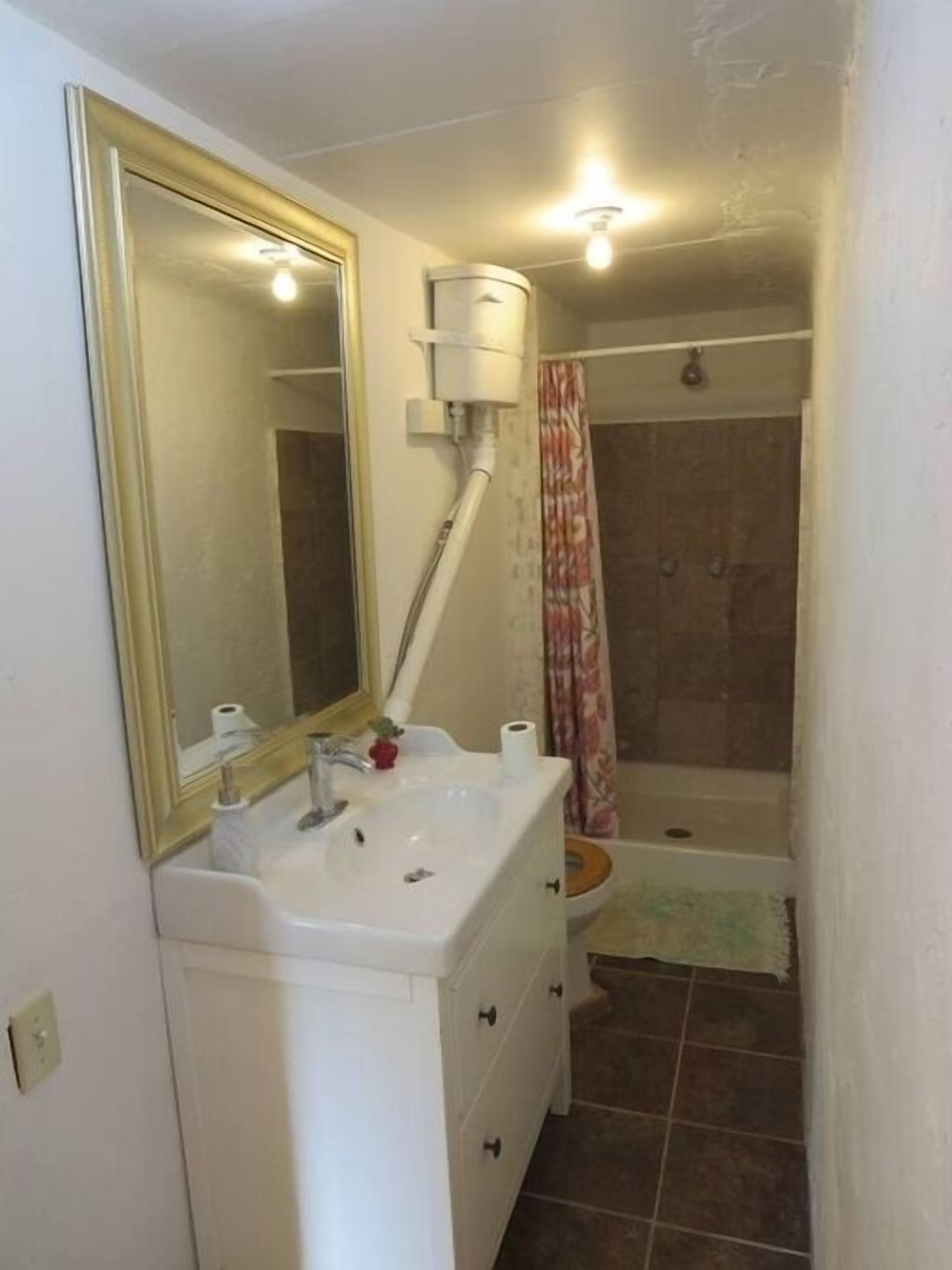 Shower, towels, soap, toilet paper