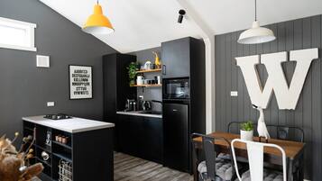 Fridge, microwave, stovetop, coffee/tea maker
