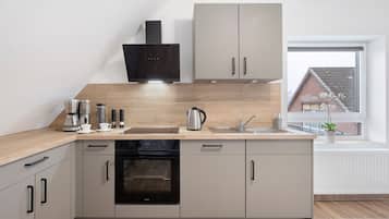 Réfrigérateur, four, plaque de cuisson, lave-vaisselle