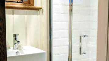 Shower, eco-friendly toiletries, hair dryer, towels
