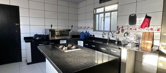 Two houses within the yard, plus a shed and ample space for parties and fun.