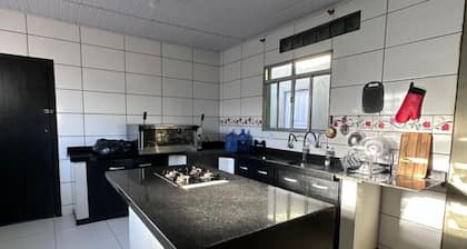 Two houses within the yard, plus a shed and ample space for parties and fun.