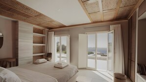Une chambre à coucher avec un grand lit, une table de chevet, une chaise, une armoire et une fenêtre donnant sur un beau paysage.
