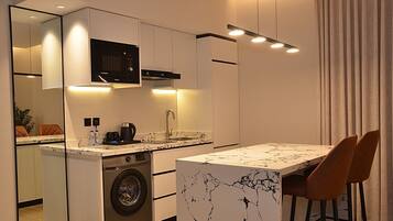 Duplex | Private kitchen | Microwave, stovetop, cookware/dishes/utensils