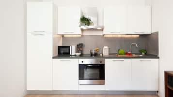 Apartment (1 Bedroom) | Private kitchen | Microwave, oven, stovetop, dishwasher