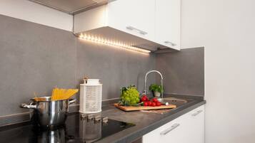 Apartment (1 Bedroom) | Private kitchen | Microwave, oven, stovetop, dishwasher