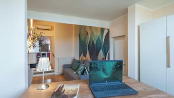 Apartment (1 Bedroom) | Living area | 32-inch TV with cable channels