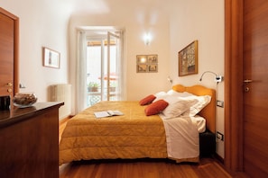 Apartamento (1 Bedroom) | 1 quarto, ferros/tábuas de passar roupa, roupa de cama