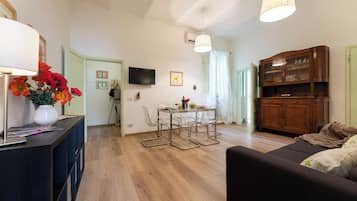 Apartment (2 Bedrooms) | Living area | 32-inch TV with cable channels