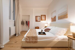 Appartement (3 Bedrooms) | 3 chambres, fer et planche à repasser, literie fournie