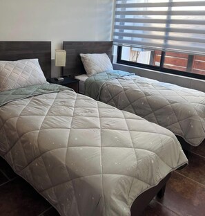3 dormitorios, tabla de planchar con plancha, wifi y ropa de cama
