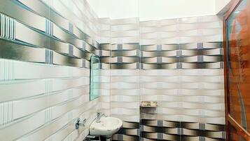 Basic Double or Twin Room | Bathroom | Shower, slippers, towels, soap