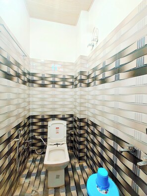 Basic Double or Twin Room | Bathroom | Shower, slippers, towels, soap - Hotel Awadh Star Palace (Ayodhya)