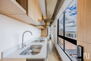 Microwave, stovetop, coffee/tea maker, cookware/dishes/utensils - NOK Modern 1BR Apartment at Usaquen, Bogota (Bogotá)