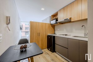 Microwave, stovetop, coffee/tea maker, cookware/dishes/utensils - NOK Luxury 1BR Apartment at Usaquen North Bogota (Bogotá)