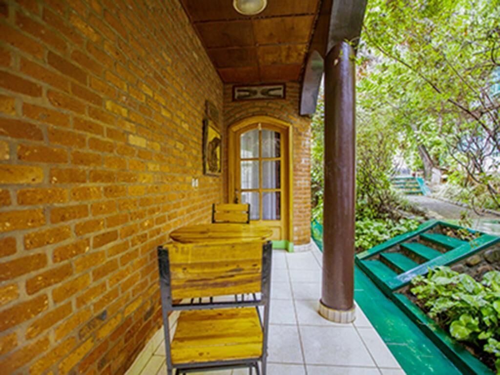 Apartment, Balcony, Garden View | Outdoor dining