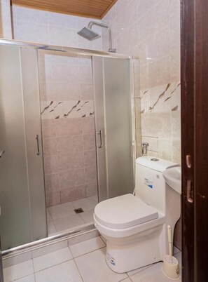 Twin Room, Balcony, Garden View | Bathroom | Bathrobes, slippers - Hotel Saint Jean Leopold (Kigali)