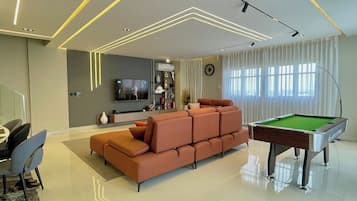 Economy Apartment, Balcony, City View | Games room