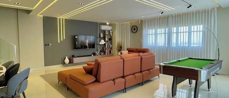 Economy Apartment, Balcony, City View | Game room